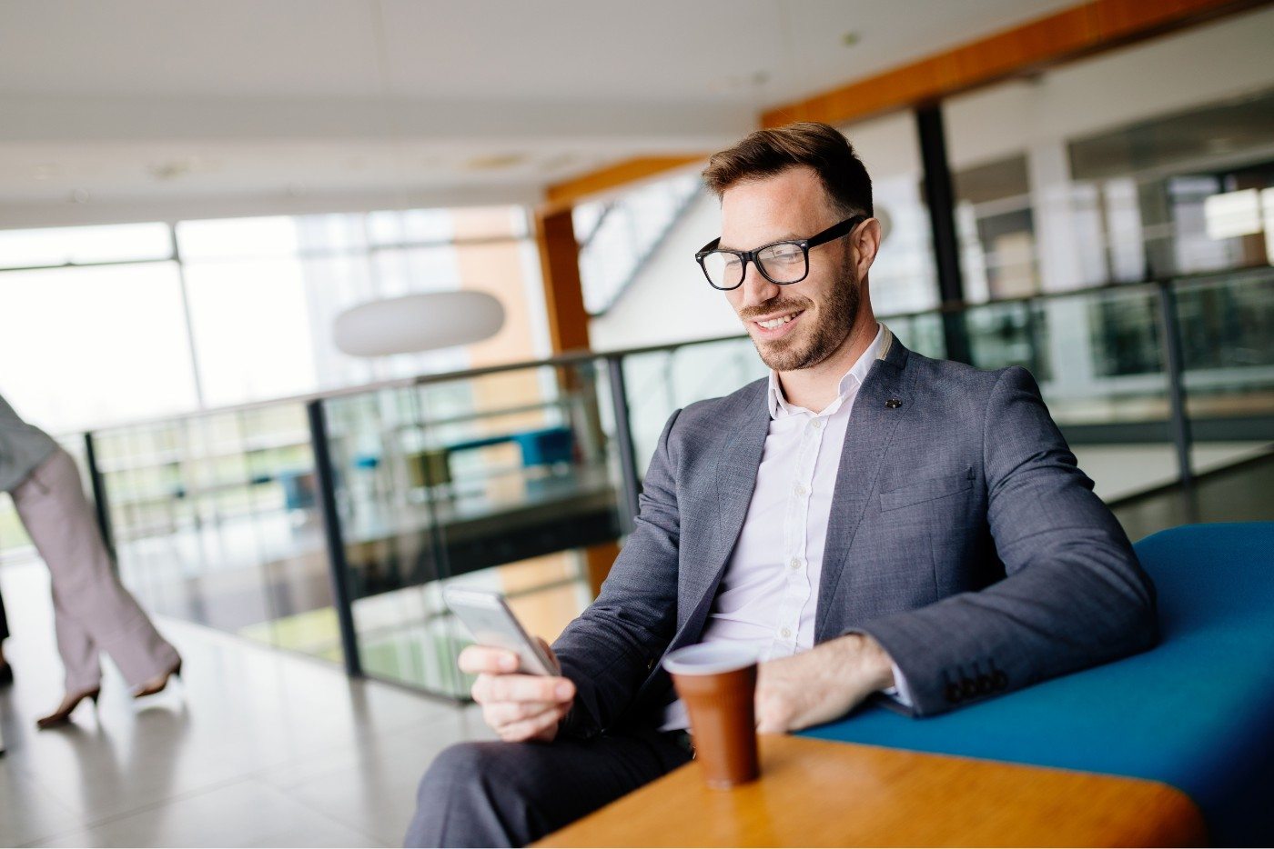 demo-attachment-1046-businessman-taking-a-break-with-a-cup-of-coffee-JW4B3DH